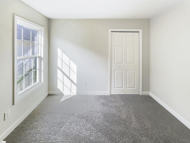 10 Maplecroft St, Greenville, SC 29609 - unfurnished room featuring carpet floors and baseboards