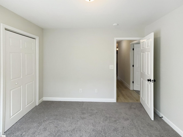 10 Maplecroft St, Greenville, SC 29609 - unfurnished bedroom with light carpet and baseboards