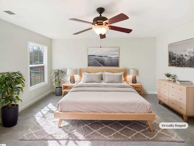 10 Maplecroft St, Greenville, SC 29609 - carpeted bedroom featuring ceiling fan and baseboards