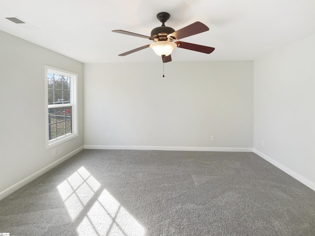 10 Maplecroft St, Greenville, SC 29609 - carpeted spare room with baseboards and a ceiling fan