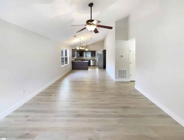 10 Maplecroft St, Greenville, SC 29609 - unfurnished living room featuring light wood-type flooring, baseboards, visible vents, and ceiling fan with notable chandelier