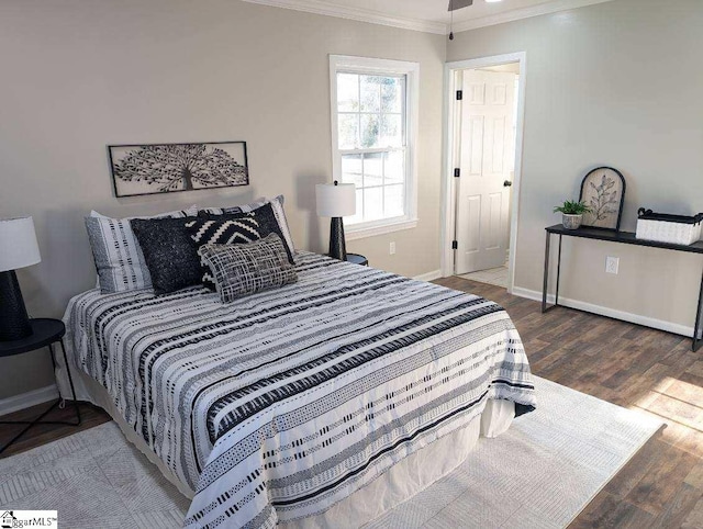 bedroom with ornamental molding and wood-type flooring