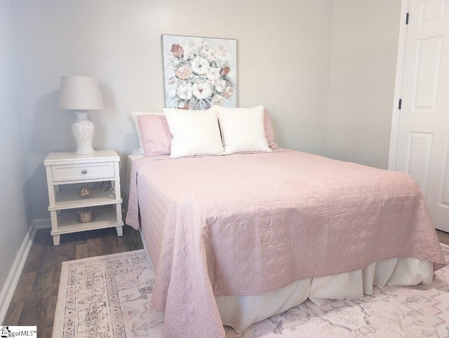 bedroom featuring hardwood / wood-style flooring