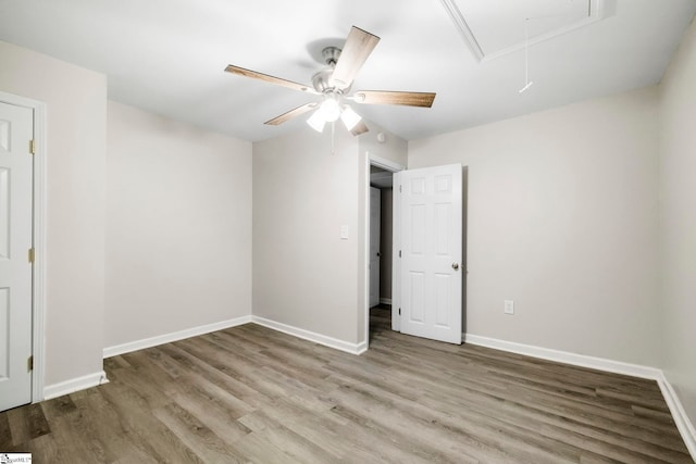 unfurnished bedroom with hardwood / wood-style flooring and ceiling fan