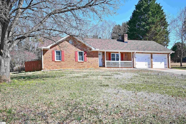 single story home with a front lawn, a garage, and a porch