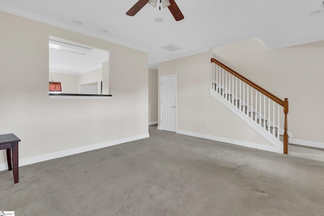 unfurnished living room featuring crown molding, ceiling fan, and carpet