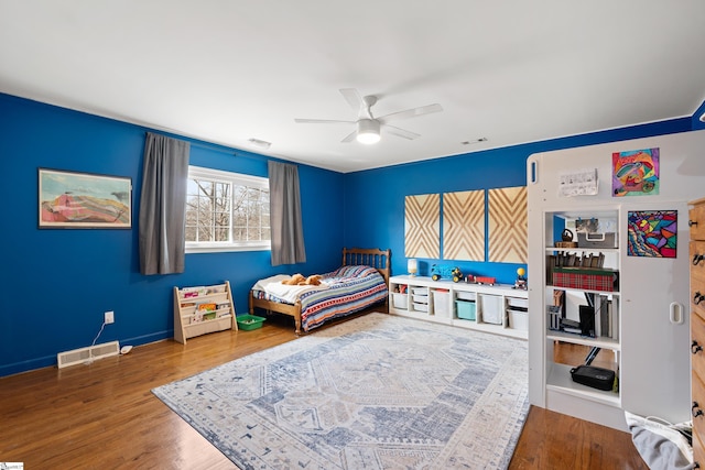 bedroom featuring wood-type flooring and ceiling fan