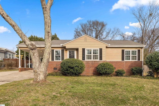 ranch-style home with concrete driveway, a front lawn, crawl space, and brick siding