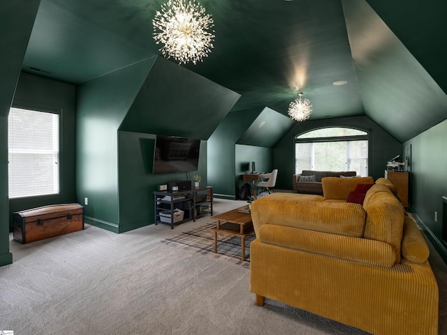 interior space with a notable chandelier, vaulted ceiling, carpet, and baseboards