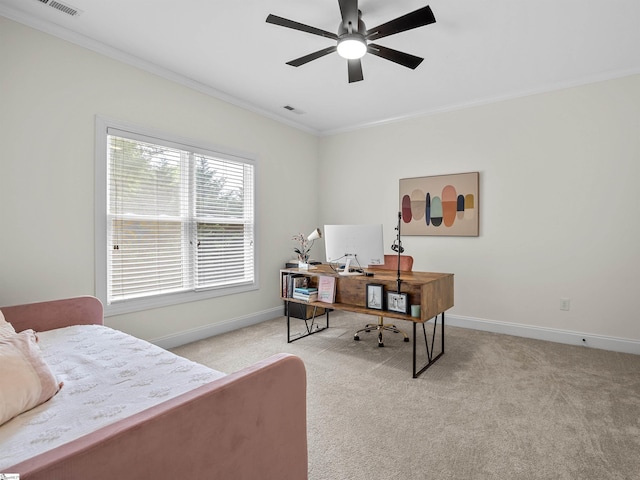 bedroom featuring ornamental molding, baseboards, visible vents, and light colored carpet