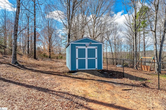 view of shed with a playground