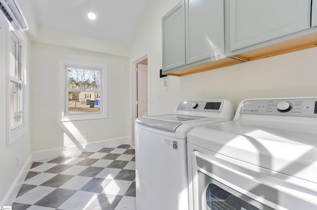 laundry area with cabinet space, baseboards, dark floors, washer and dryer, and recessed lighting