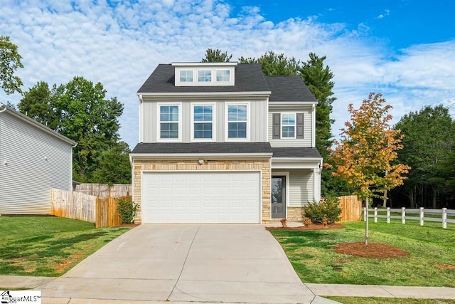 view of front facade featuring a garage, concrete driveway, fence, and a front lawn