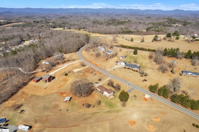 drone / aerial view featuring a mountain view