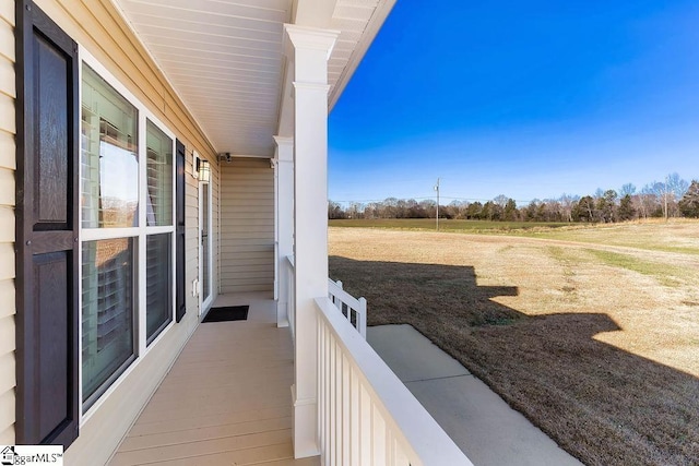 view of yard featuring covered porch