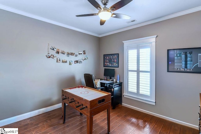 office with dark wood-style floors, crown molding, visible vents, and baseboards