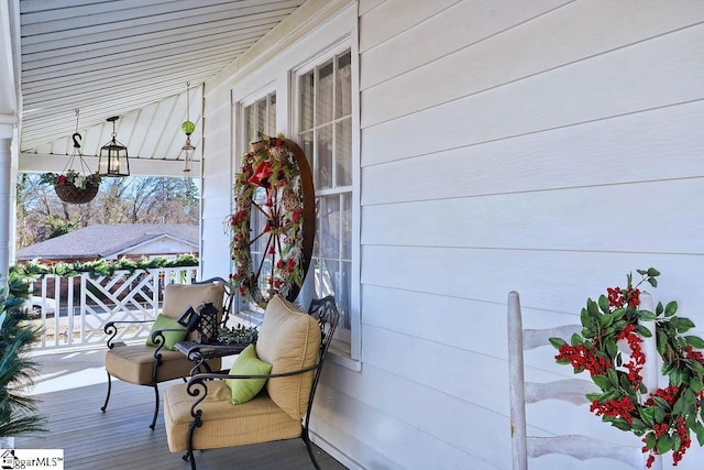 wooden deck with a porch