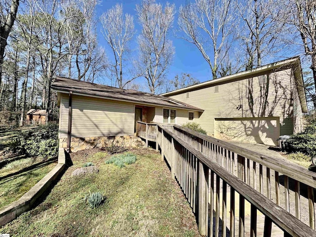 rear view of house with a deck