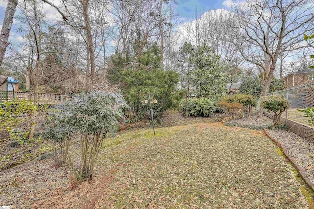 view of yard with fence