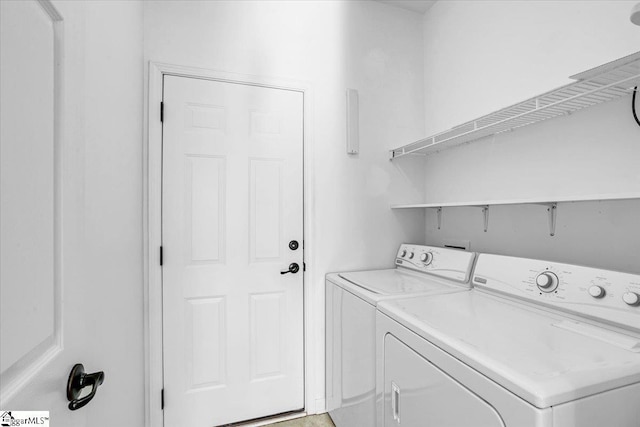 laundry area featuring laundry area and independent washer and dryer