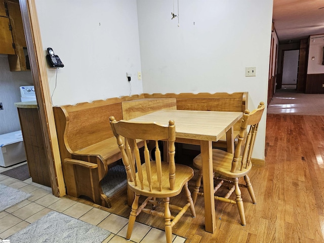 dining space with light wood-type flooring