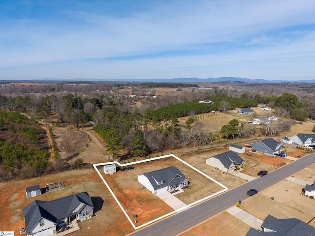 bird's eye view featuring a residential view and a mountain view