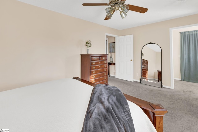 bedroom featuring carpet floors, baseboards, and a ceiling fan