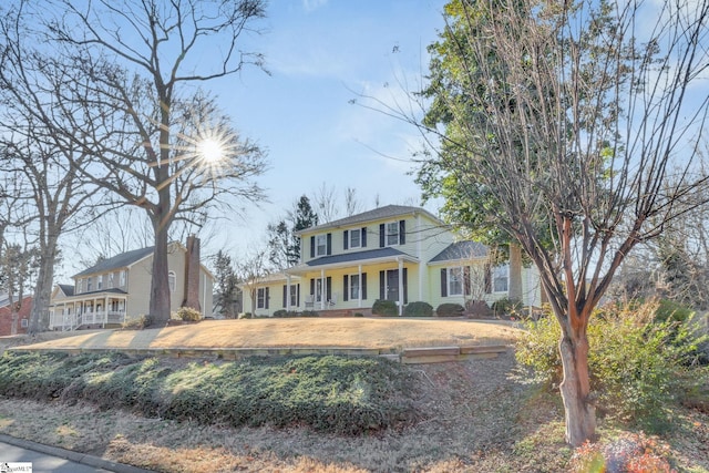 view of front of home with a front yard