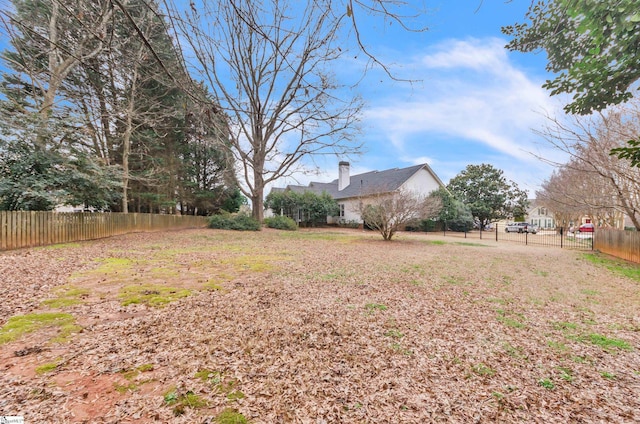 view of yard with fence