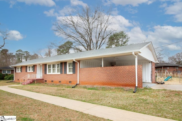 single story home with a carport, a front lawn, crawl space, and brick siding