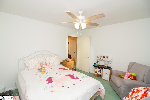 bedroom featuring carpet flooring and a ceiling fan