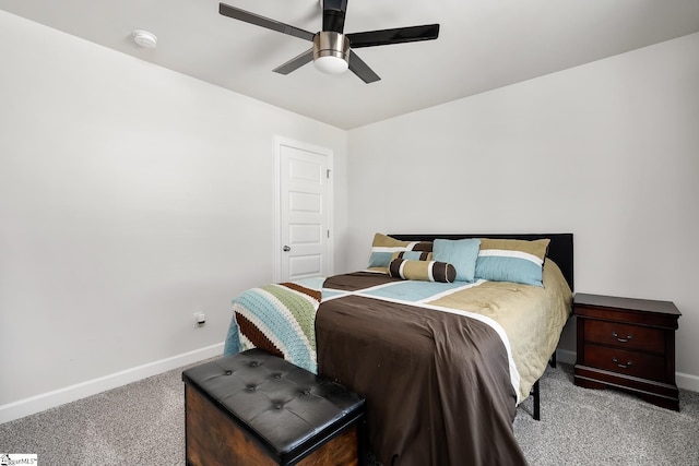 bedroom featuring ceiling fan, baseboards, and carpet flooring