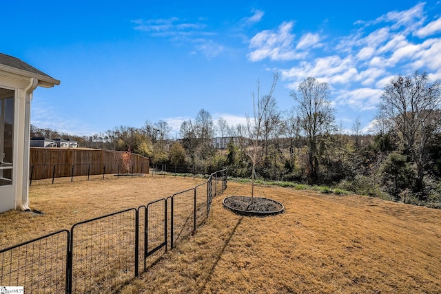 view of yard with a gate and fence