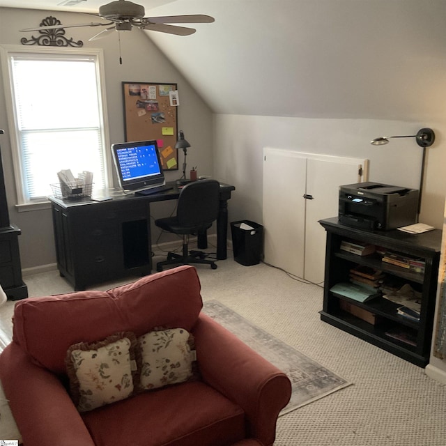 office area with light carpet, ceiling fan, and vaulted ceiling