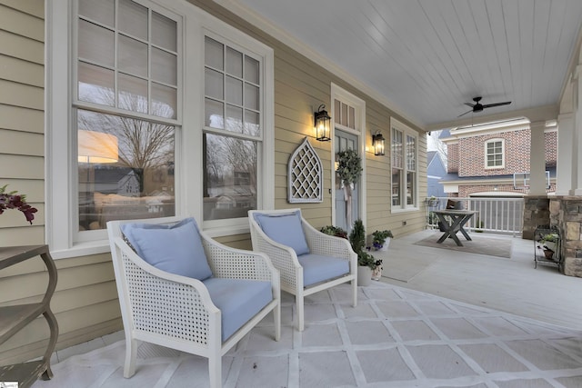 view of patio with a porch, ceiling fan, and central air condition unit