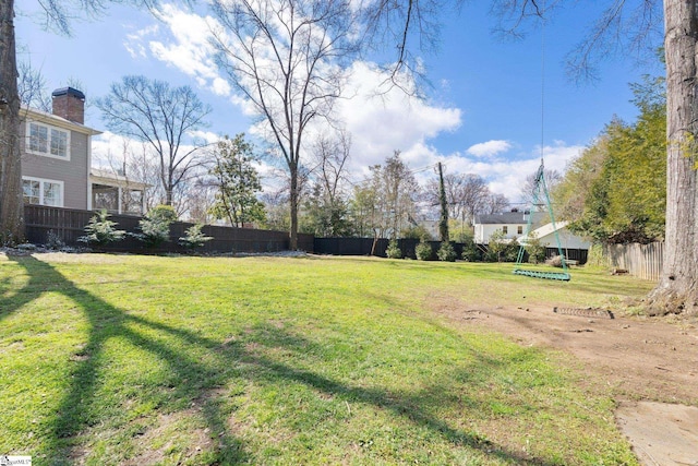 view of yard with fence