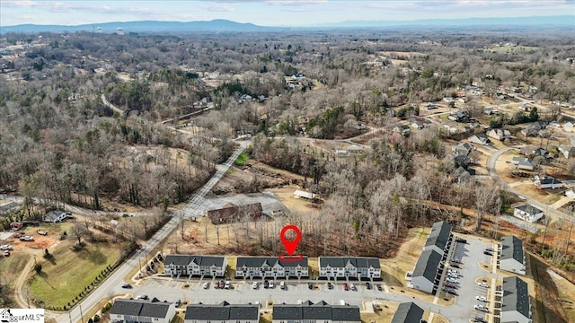 birds eye view of property featuring a mountain view