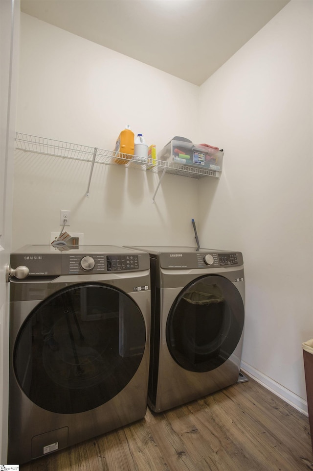 128 Lake Grove Rd, Simpsonville, SC 29681 - laundry area with laundry area, baseboards, dark wood-style floors, and washing machine and clothes dryer