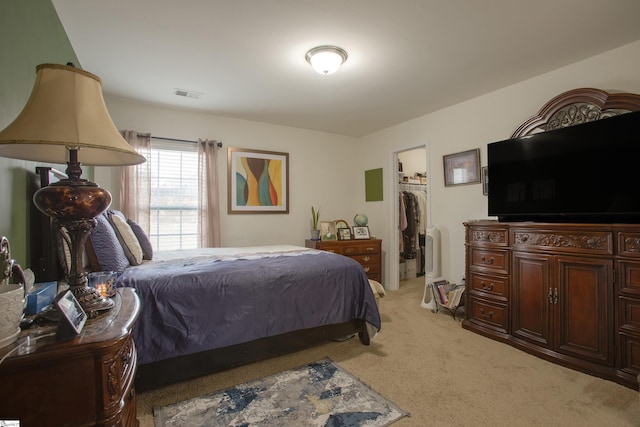 128 Lake Grove Rd, Simpsonville, SC 29681 - bedroom featuring light colored carpet, a closet, visible vents, and a spacious closet