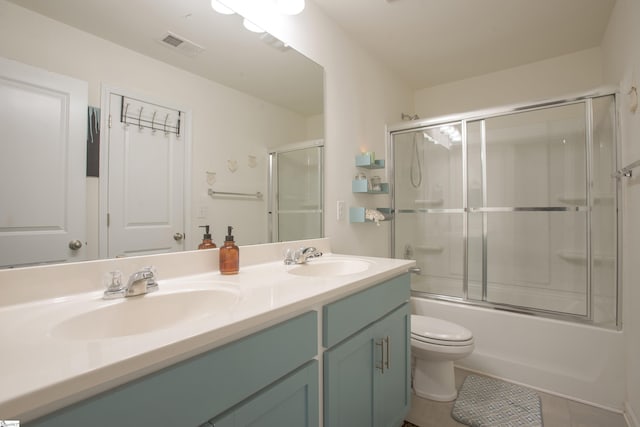 128 Lake Grove Rd, Simpsonville, SC 29681 - full bathroom with toilet, combined bath / shower with glass door, a sink, and visible vents