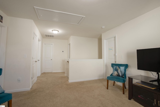 128 Lake Grove Rd, Simpsonville, SC 29681 - sitting room with attic access, light colored carpet, visible vents, and baseboards