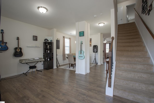 128 Lake Grove Rd, Simpsonville, SC 29681 - foyer featuring dark wood-type flooring, a ceiling fan, baseboards, and stairs