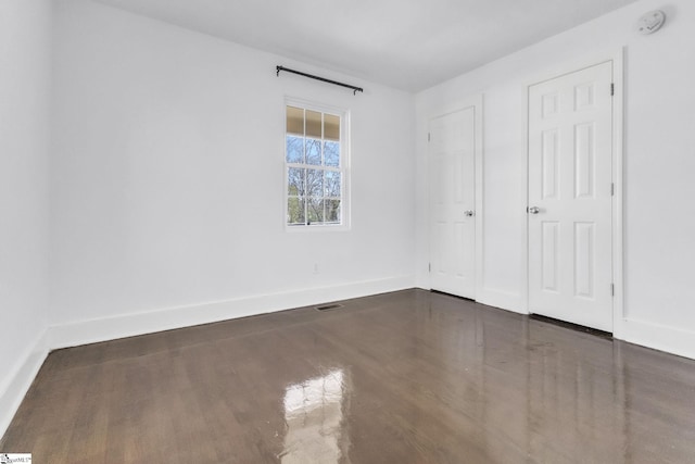 unfurnished bedroom with baseboards