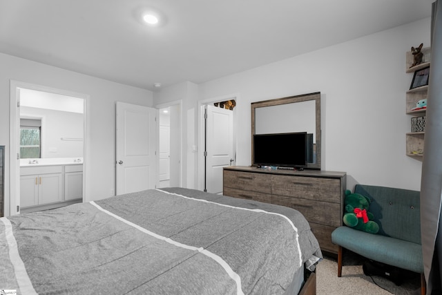 bedroom featuring connected bathroom
