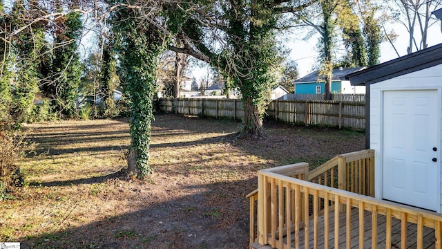 view of yard with a fenced backyard