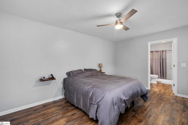 bedroom featuring dark wood-style floors, ensuite bathroom, a ceiling fan, a textured ceiling, and baseboards