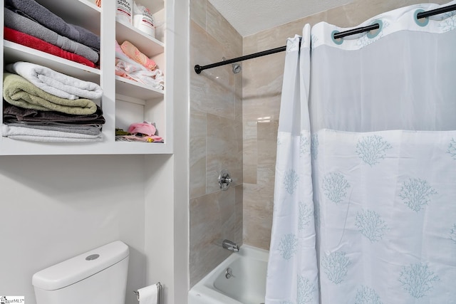 full bath with shower / bath combo, a textured ceiling, and toilet