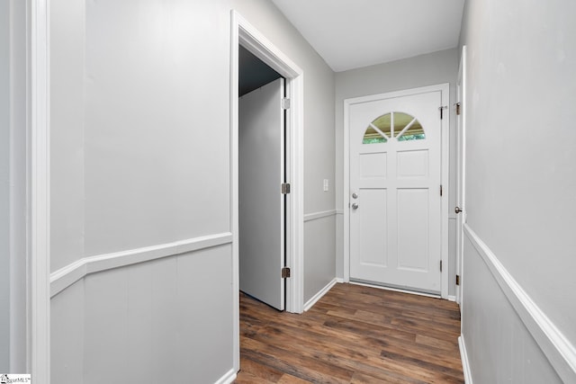 doorway to outside with dark wood finished floors