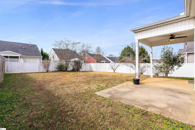 view of yard featuring ceiling fan, a patio, and a fenced backyard