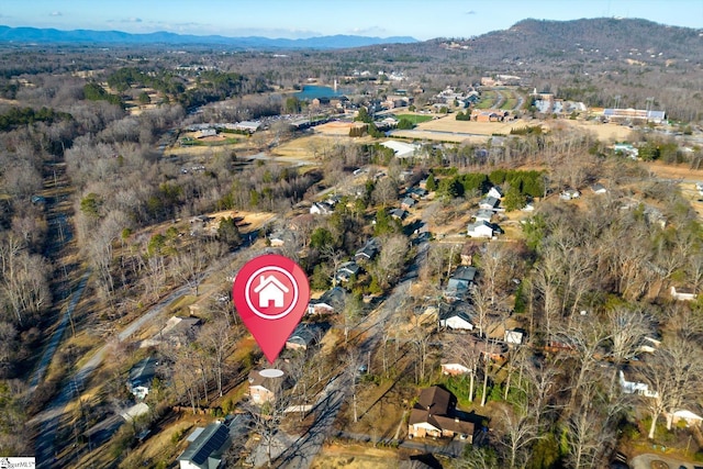 drone / aerial view featuring a mountain view